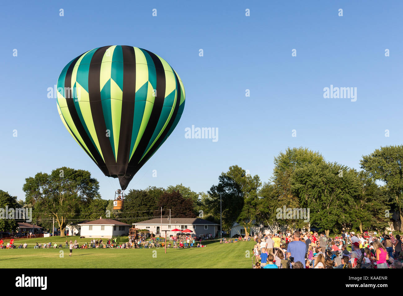 Seymour, WI August 12, 2017 Hot air balloon rising above the crowd