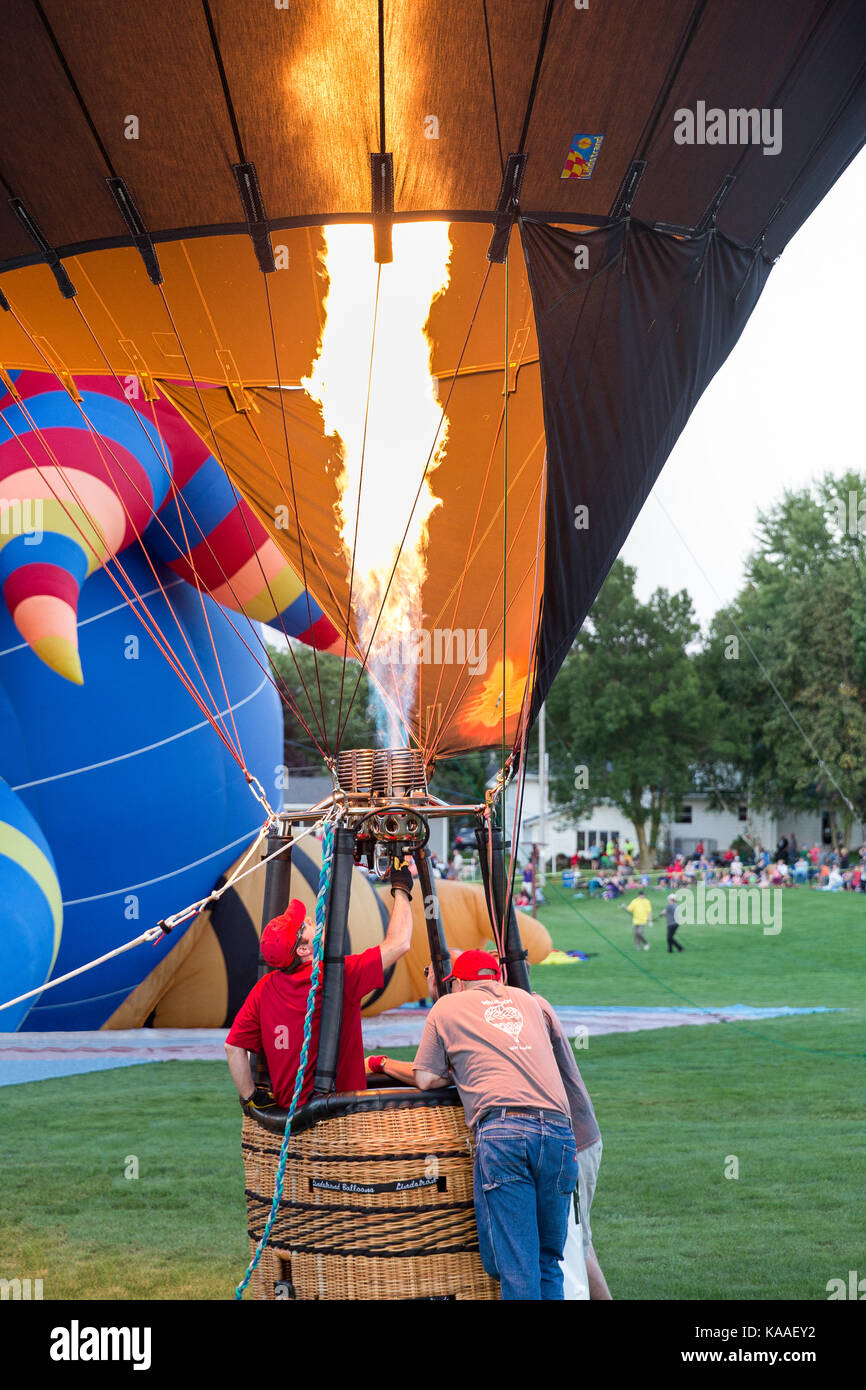 Seymour, WI - August 12, 2017: Hot air balloon crew preparing for launch during Hamburger Fest in Seymour, WI. Hot air balloons are an integral part Stock Photo