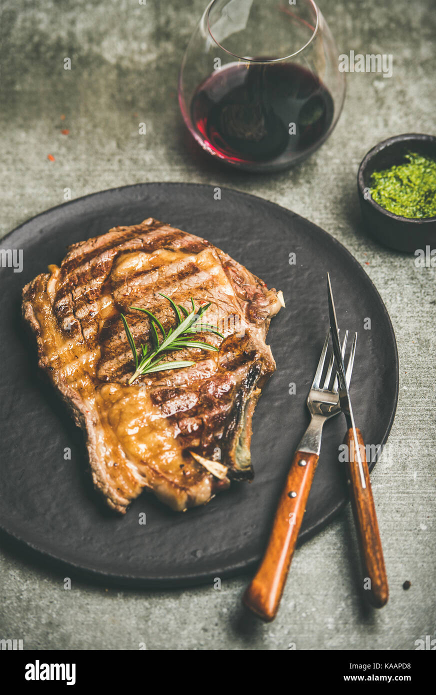 Grilled hot ribeye beef steak with red wine Stock Photo Alamy