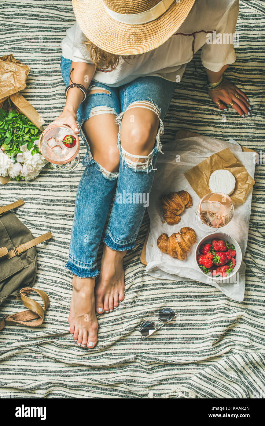 French style outdoor picnic setting with young woman in hat Stock Photo Alamy