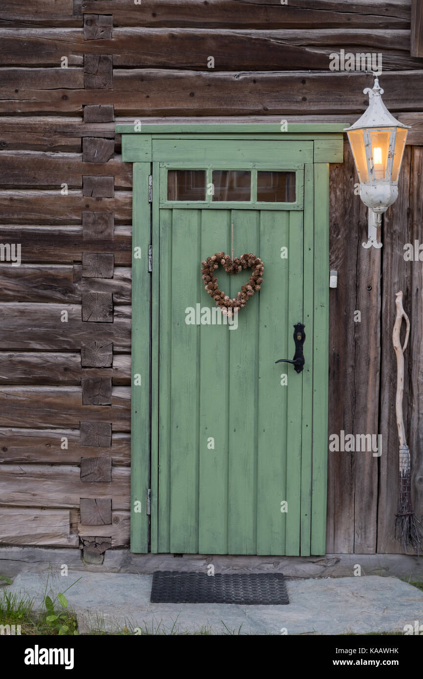 Old green door in Røros, Norway Stock Photo
