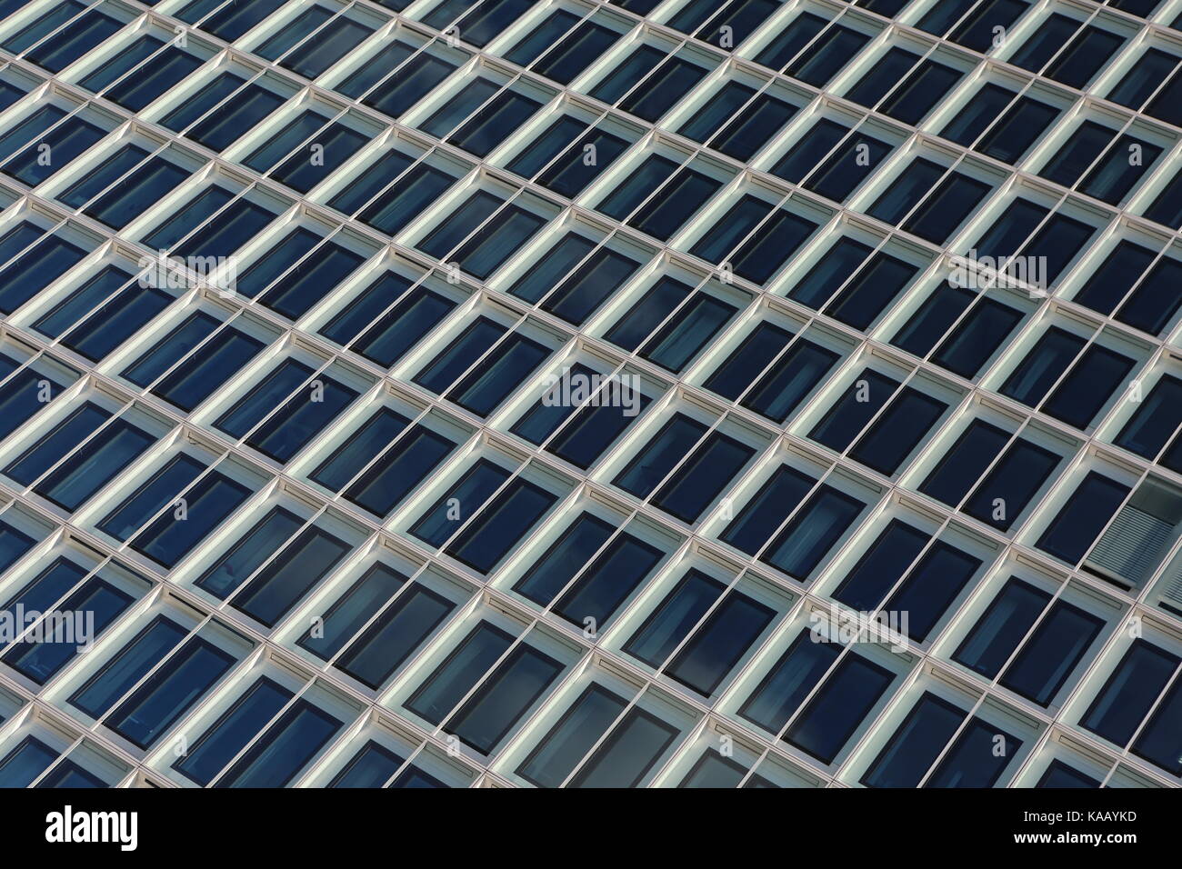 Glass facade of a skyscraper in Hamburg - Glasfasade eines Hochhauses in Hamburg Stock Photo