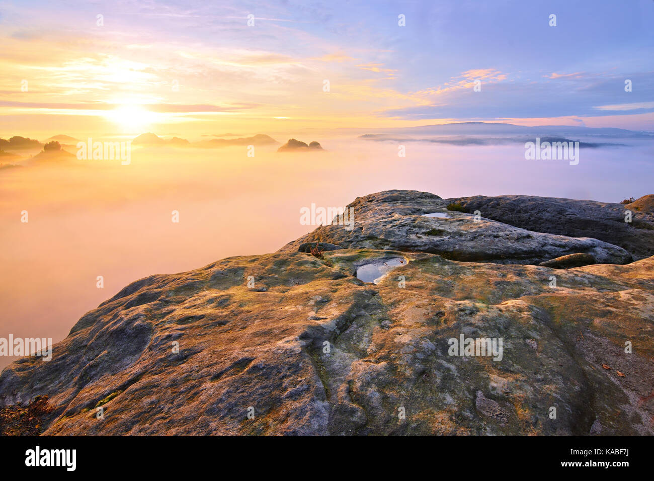 Strong Sun Rays Strong sun rays make long strips in the mist. Autumn sunny view over ...