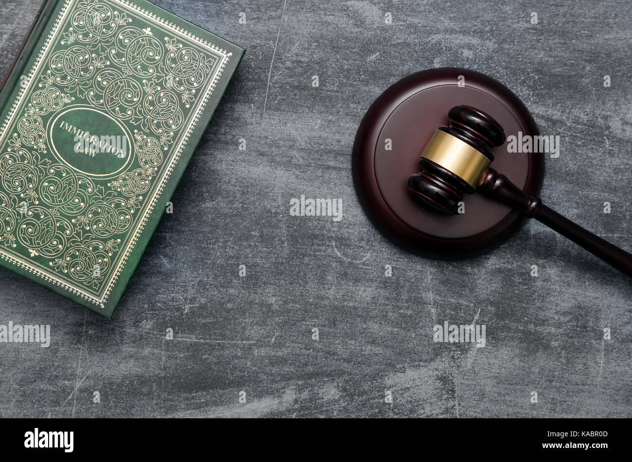 Immigration law book with judges gavel. Refugee citizenship law concept Stock Photo