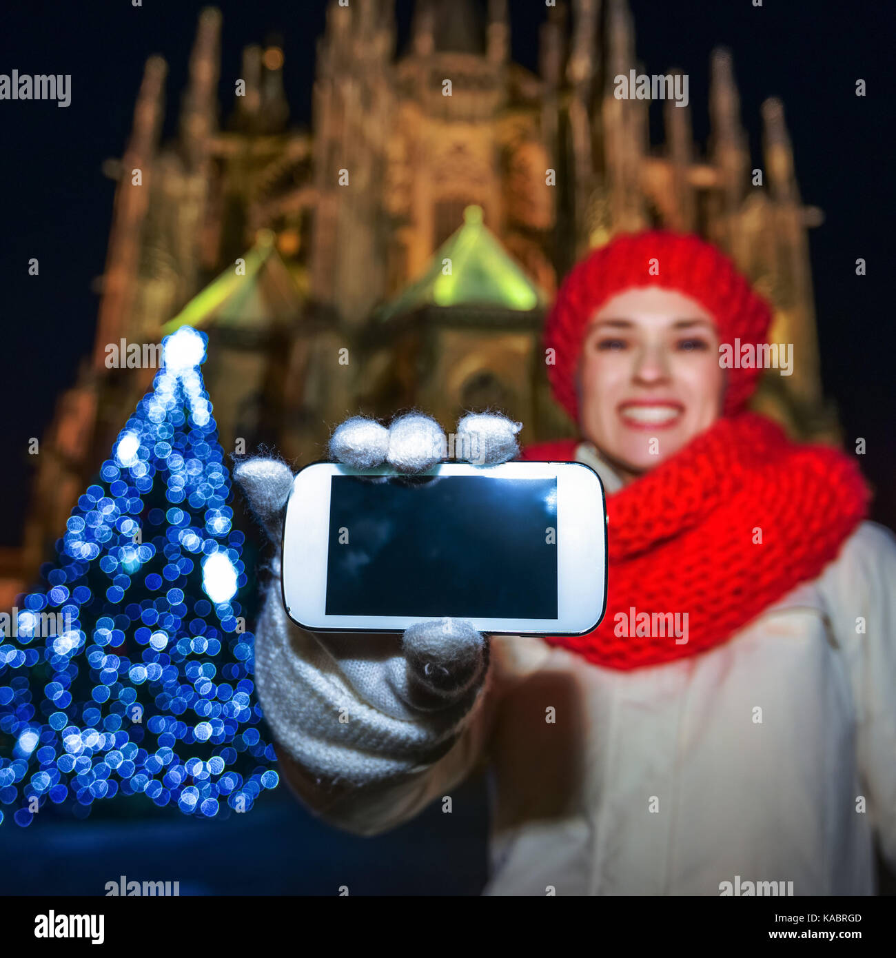 Magic on streets of the old town at Christmas. smiling young tourist ...