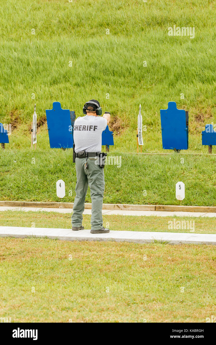 Sheriff's deputy shoots at the gun range at the law enforcement
