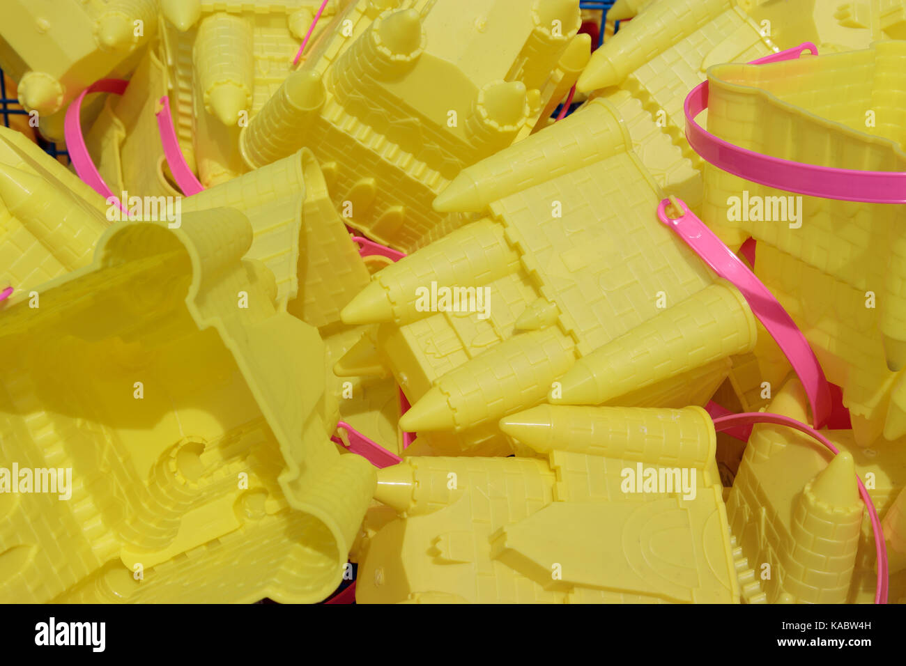 Sand buckets for sale at the seaside Stock Photo Alamy