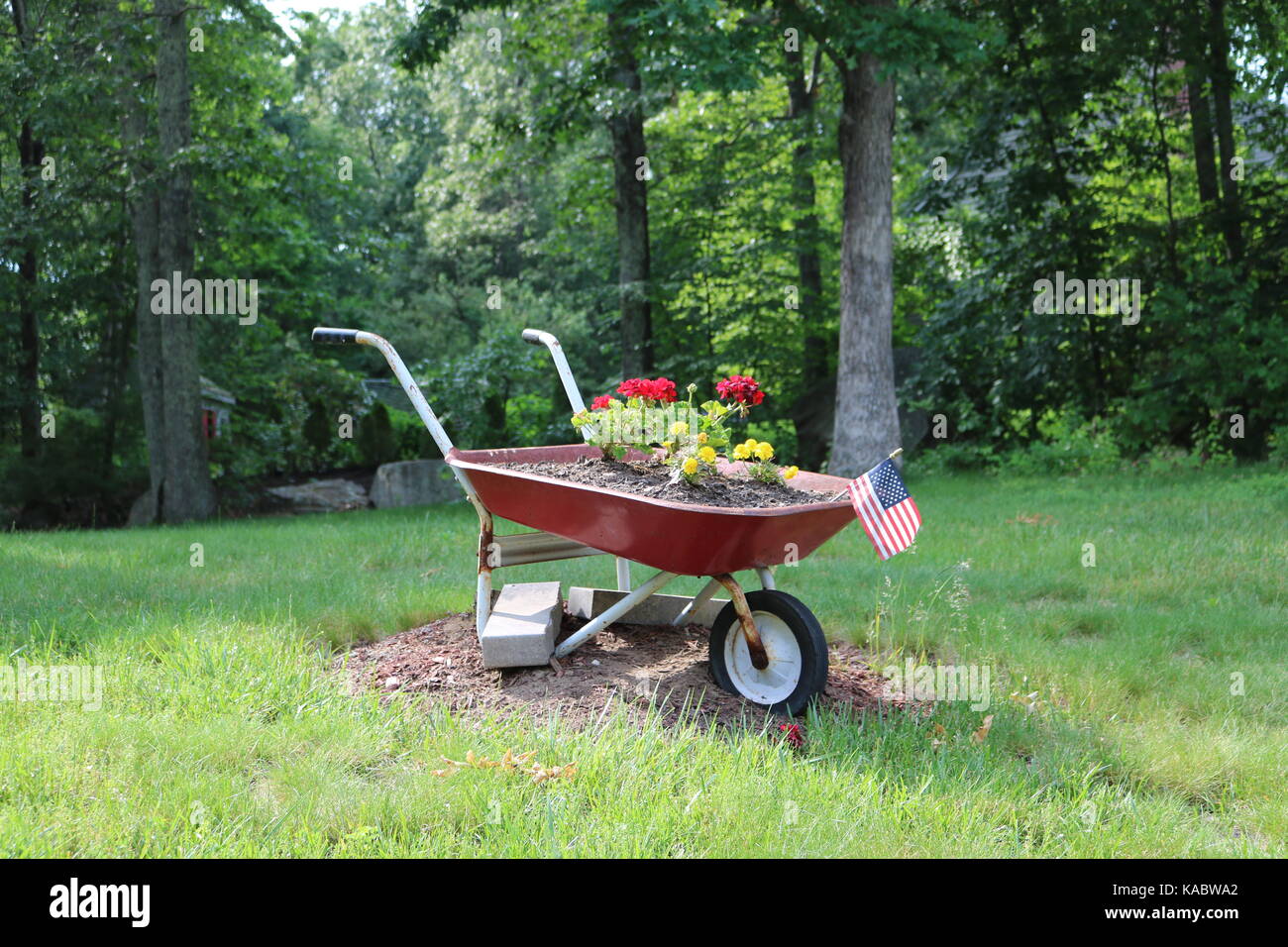 Repurposed wheelbarrow hi-res stock photography and images - Alamy