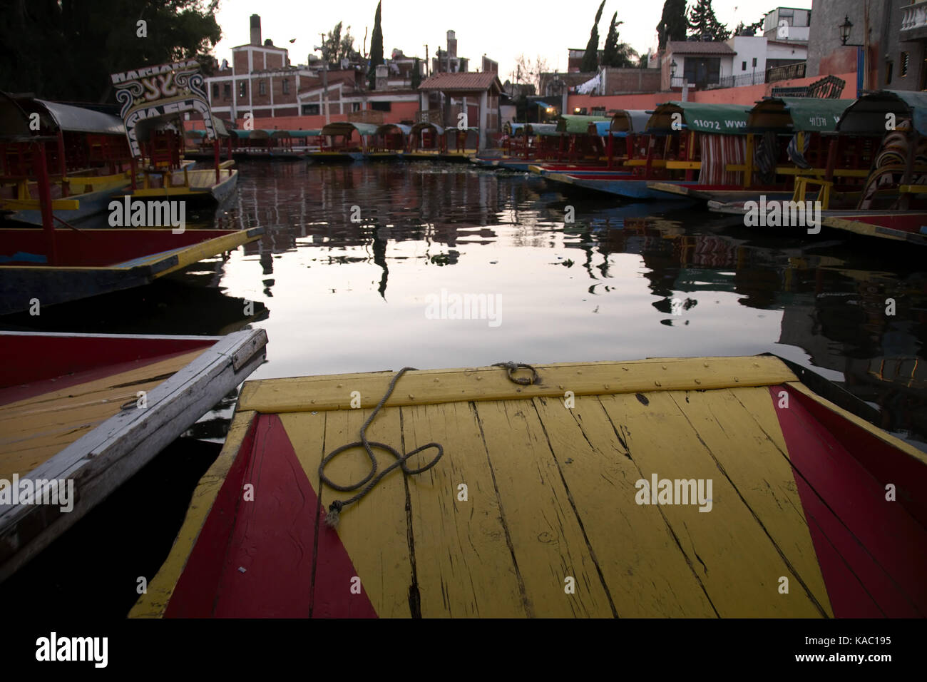 Xochimilco, Mexico City, Mexico - 2016: Trajinera boats on a canal on a weekend. Stock Photo