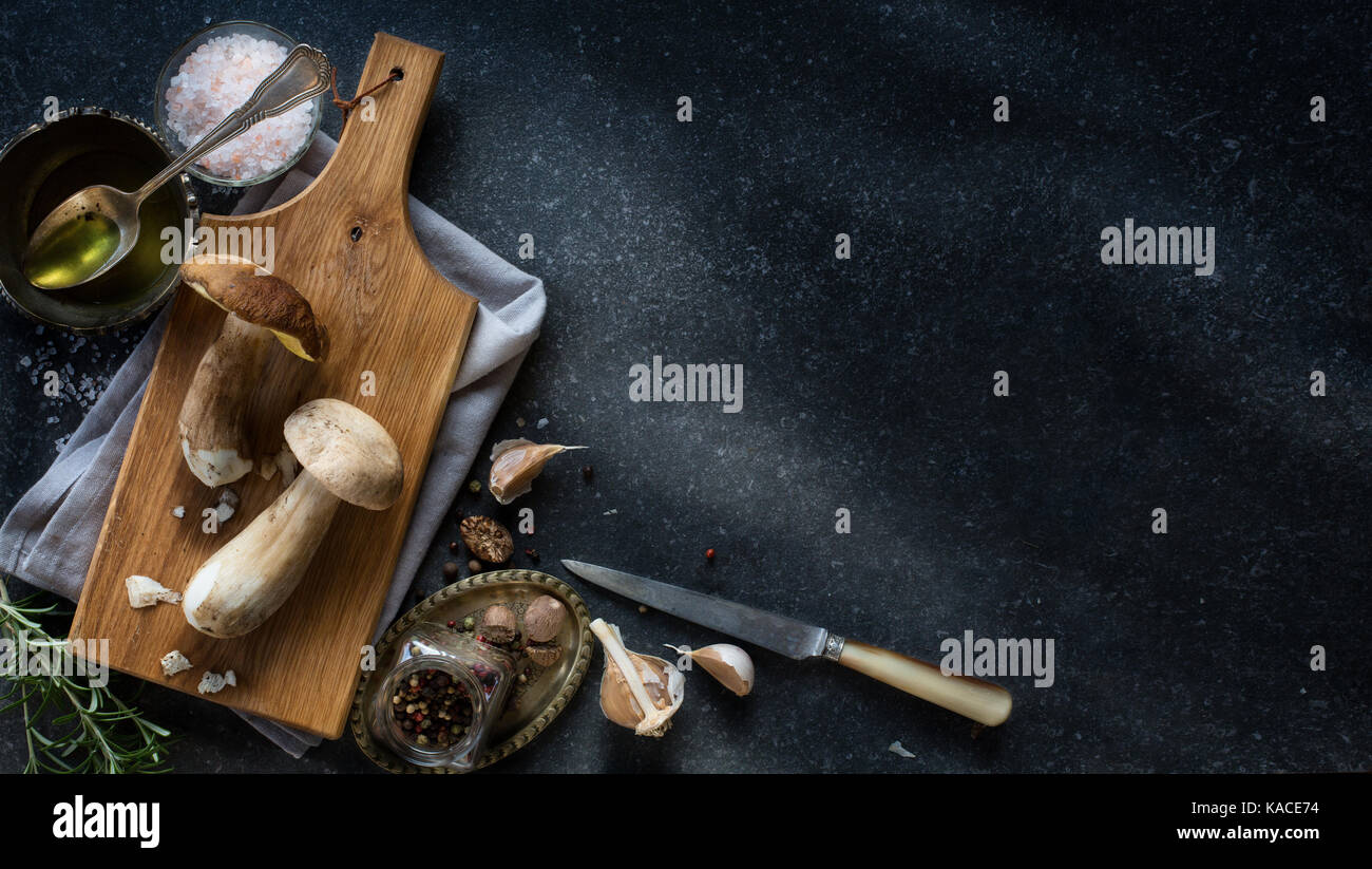 autumn cooking background; organic porcini Mushroom; seasoning forest