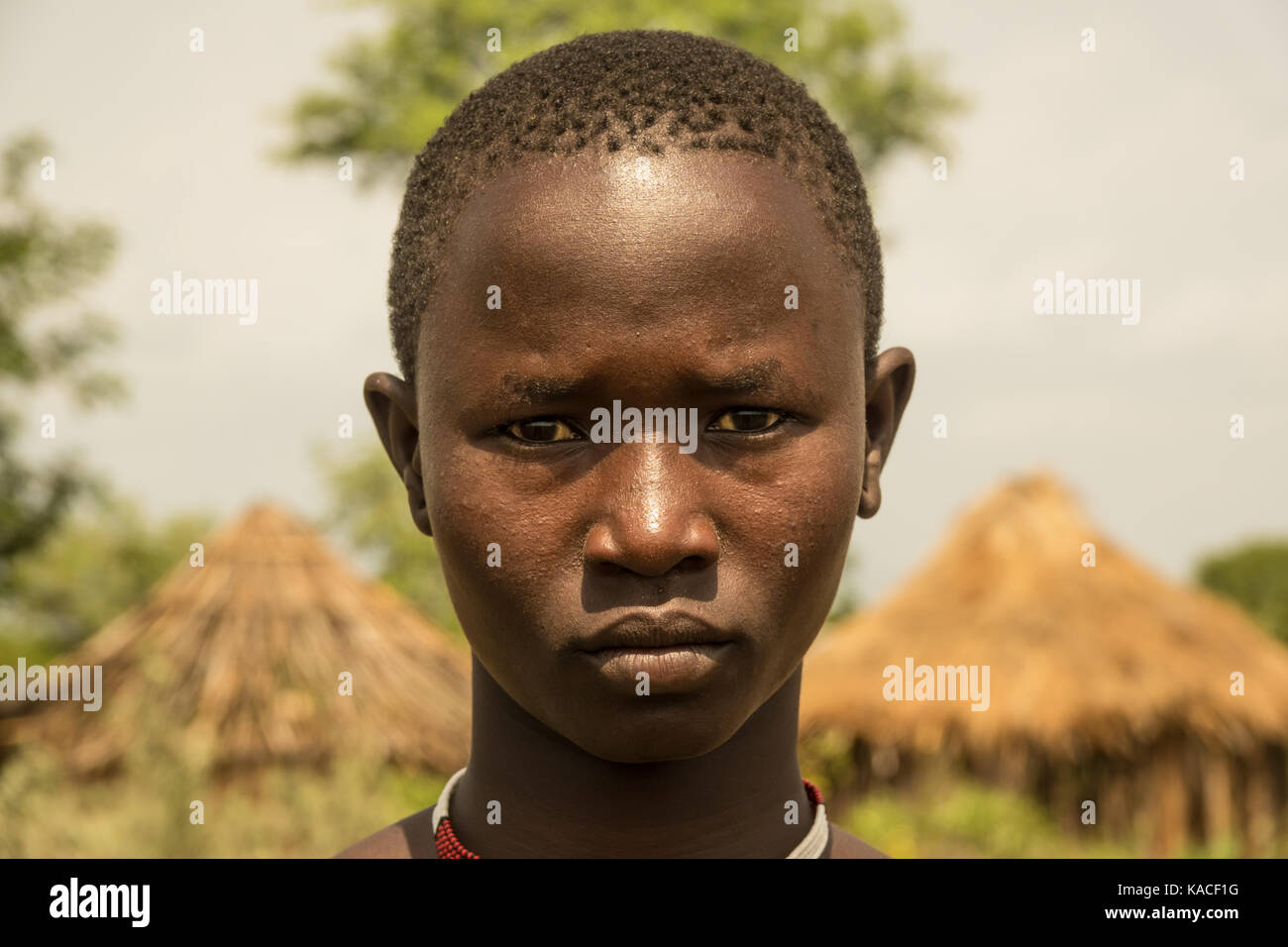 Bodi girl attending Kael ceremony, Gurra, Omo Valley, Ethiopia Stock Photo