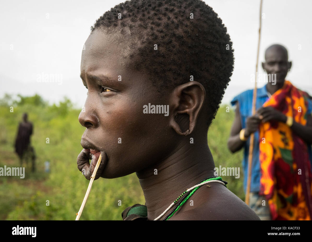 Girl attending Kael, fat men ceremony at Bodi tribe, Gurra, Omo Valley, Ethiopia Stock Photo