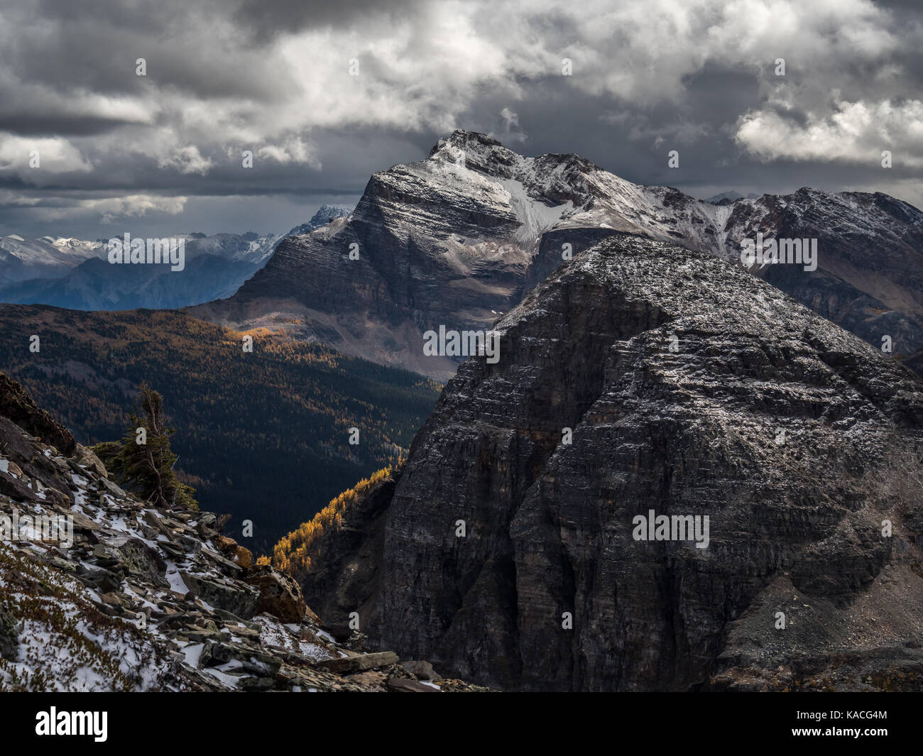 Dramatic Light on a Mountain with Fall Colors Stock Photo - Alamy