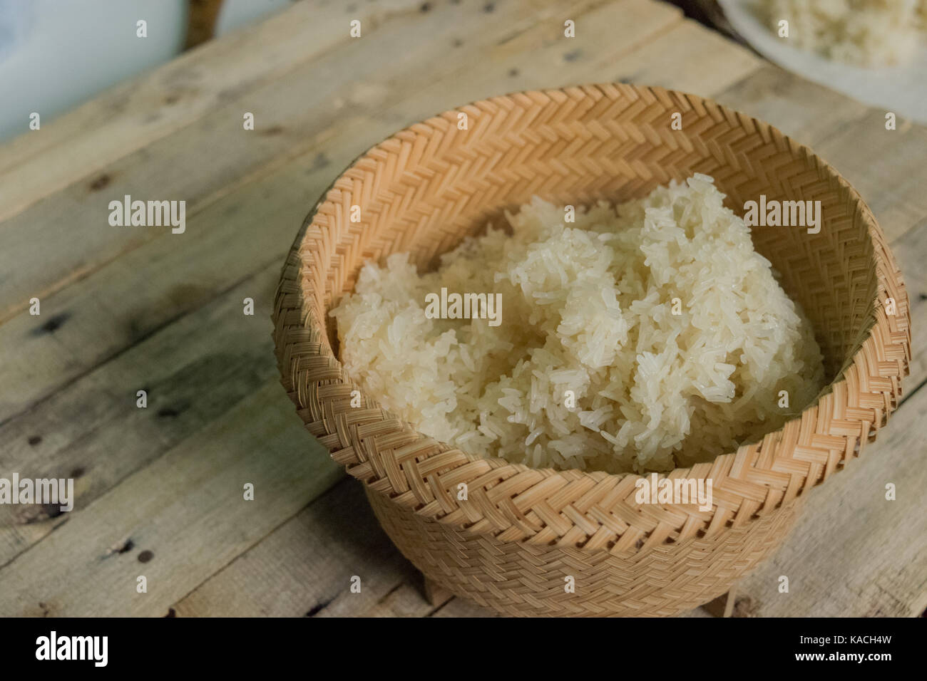 Traditional rice cooker over open fire, sticky rice cooking in a bamboo  basket over simmering water, Living Land Rice Farrm near Luang Prabang,  Laos Stock Photo - Alamy