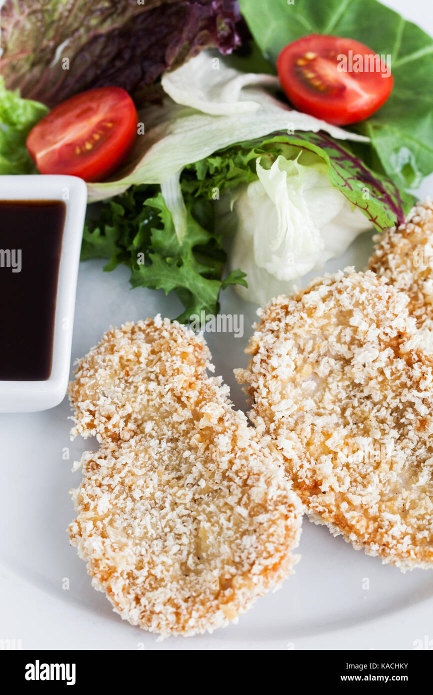 Breading pork with fresh vegetables Stock Photo