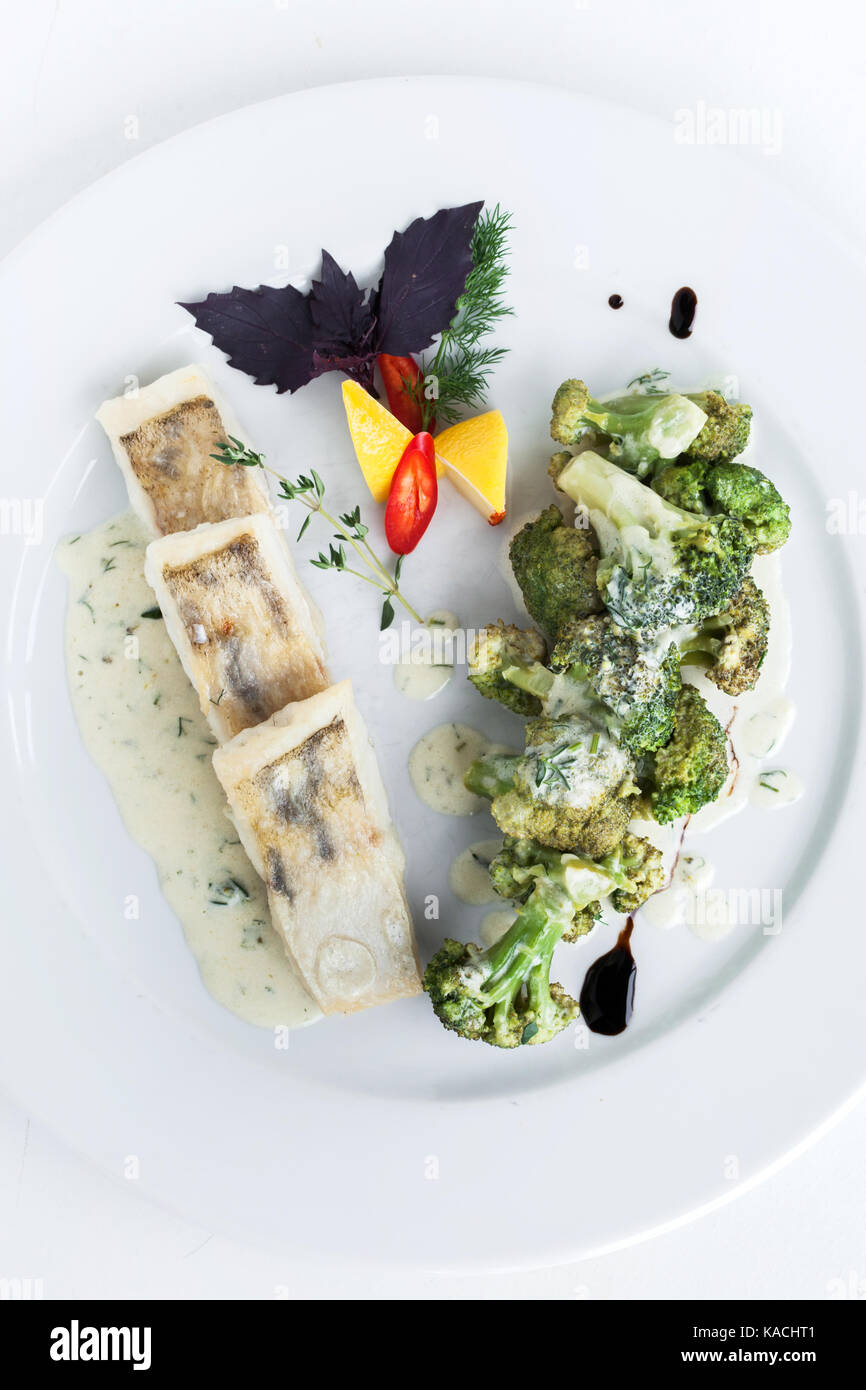 Steamed fish with broccoli Stock Photo Alamy