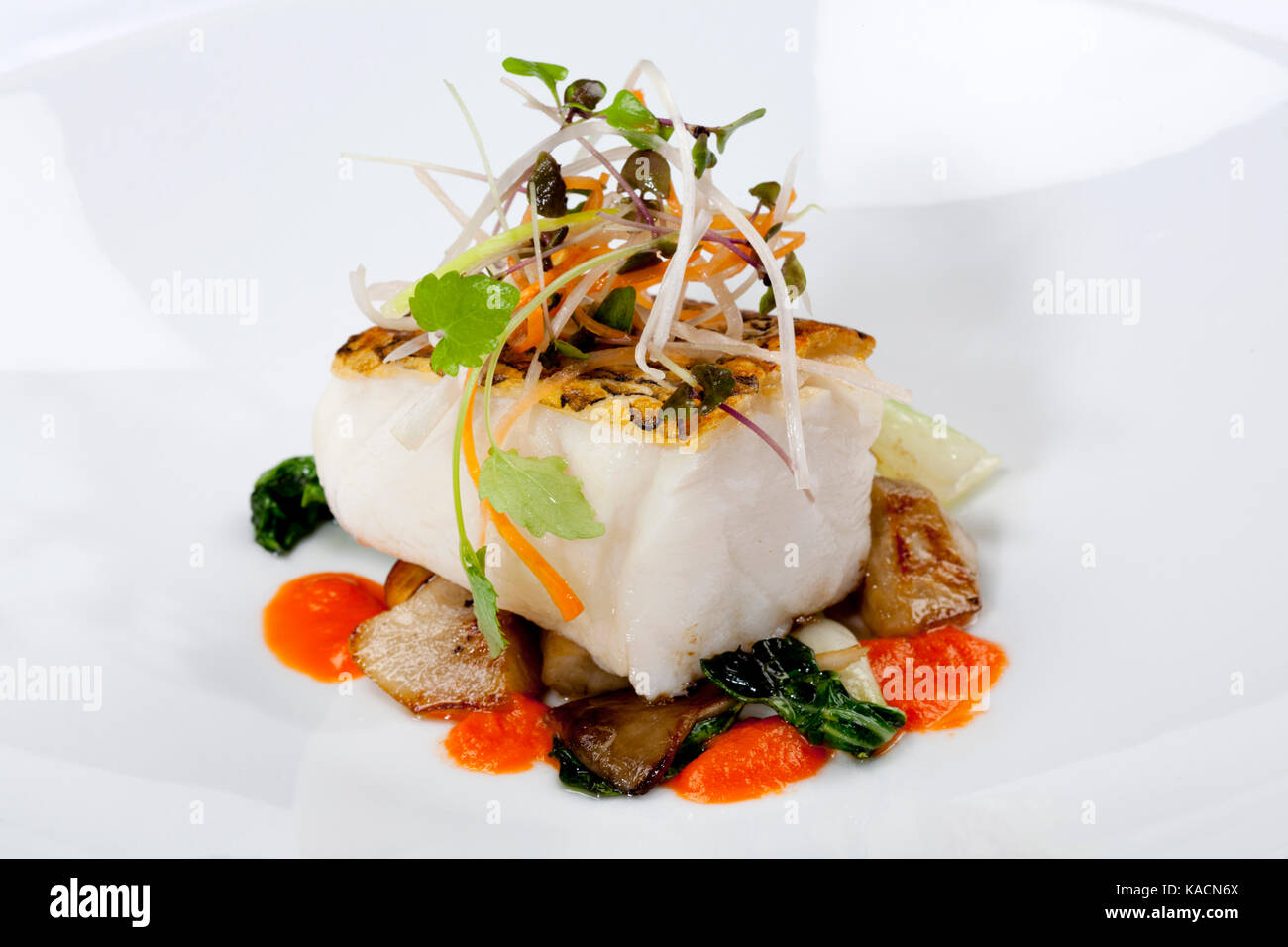 Sea bass dinner Stock Photo - Alamy