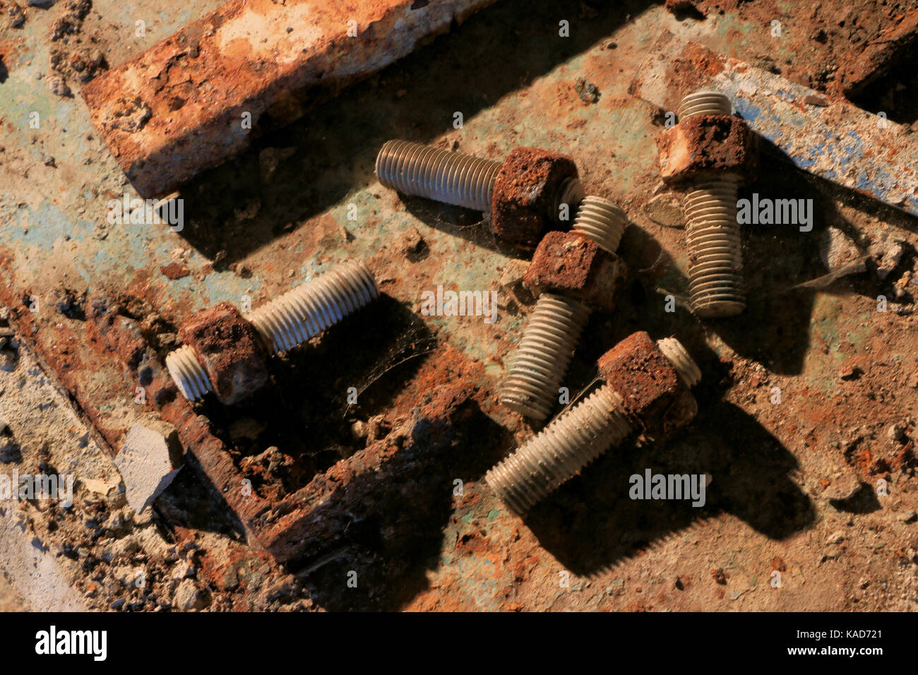 Nuts and bolts rust on floor of E B Eddy paper mill, Ottawa, Canada, closed in 2007 Stock Photo