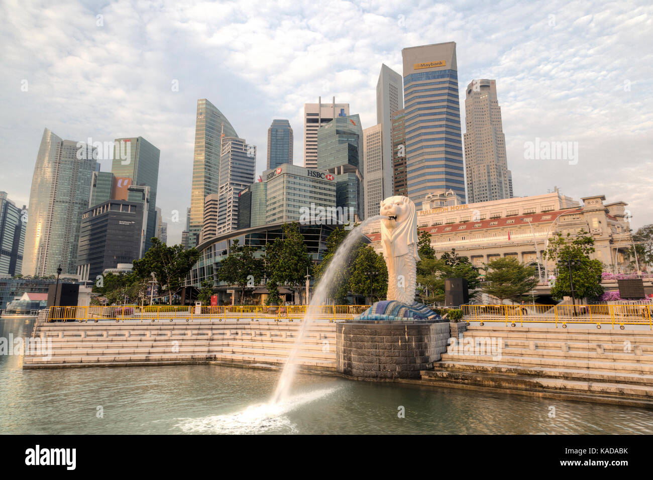 SINGAPORE - SEPTEMBER 11, 2017: Morning sunrise at Marina Bay with the iconic Merlion and the downtown central business district in the background. Th Stock Photo