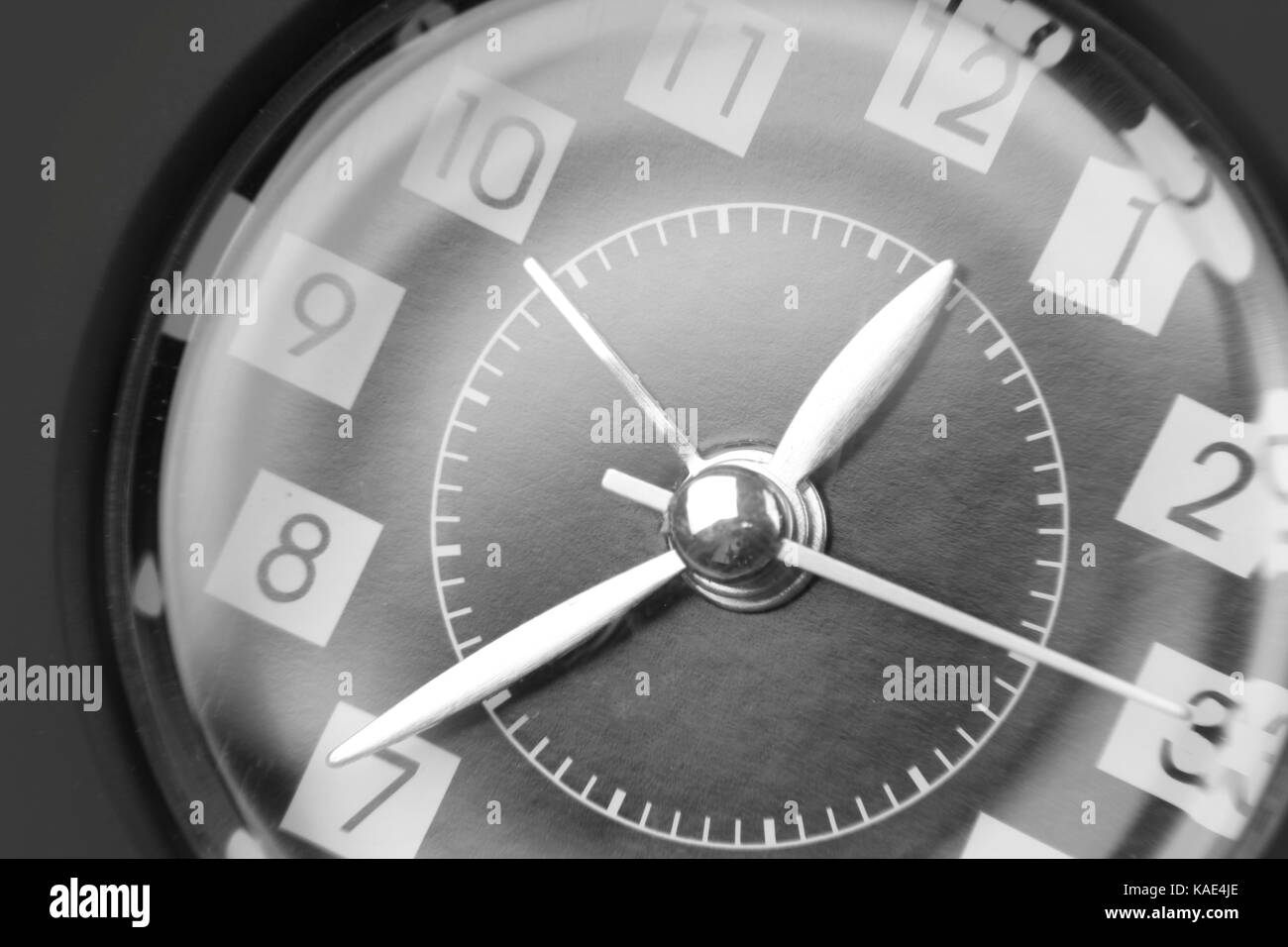 Closeup of hands on clock face Stock Photo Alamy