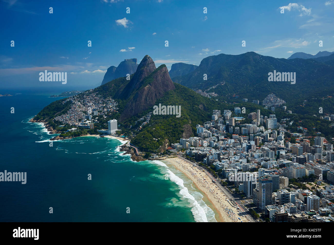 Ipanema Beach, Morro Dois Irmãos, and Vidigal Favela (left), Rio de Janeiro, Brazil, South America - aerial Stock Photo