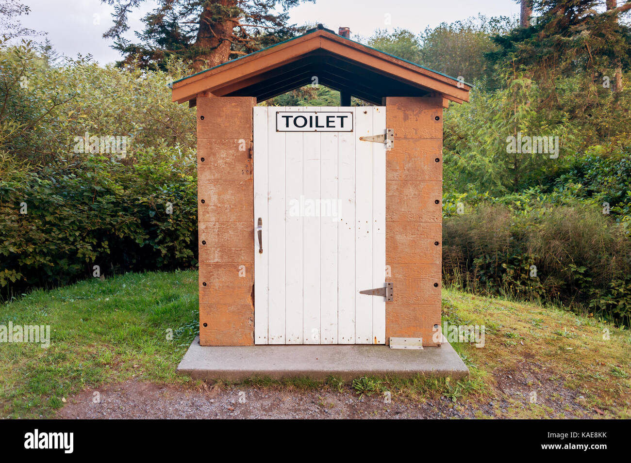 wooden toilet in a park Stock Photo