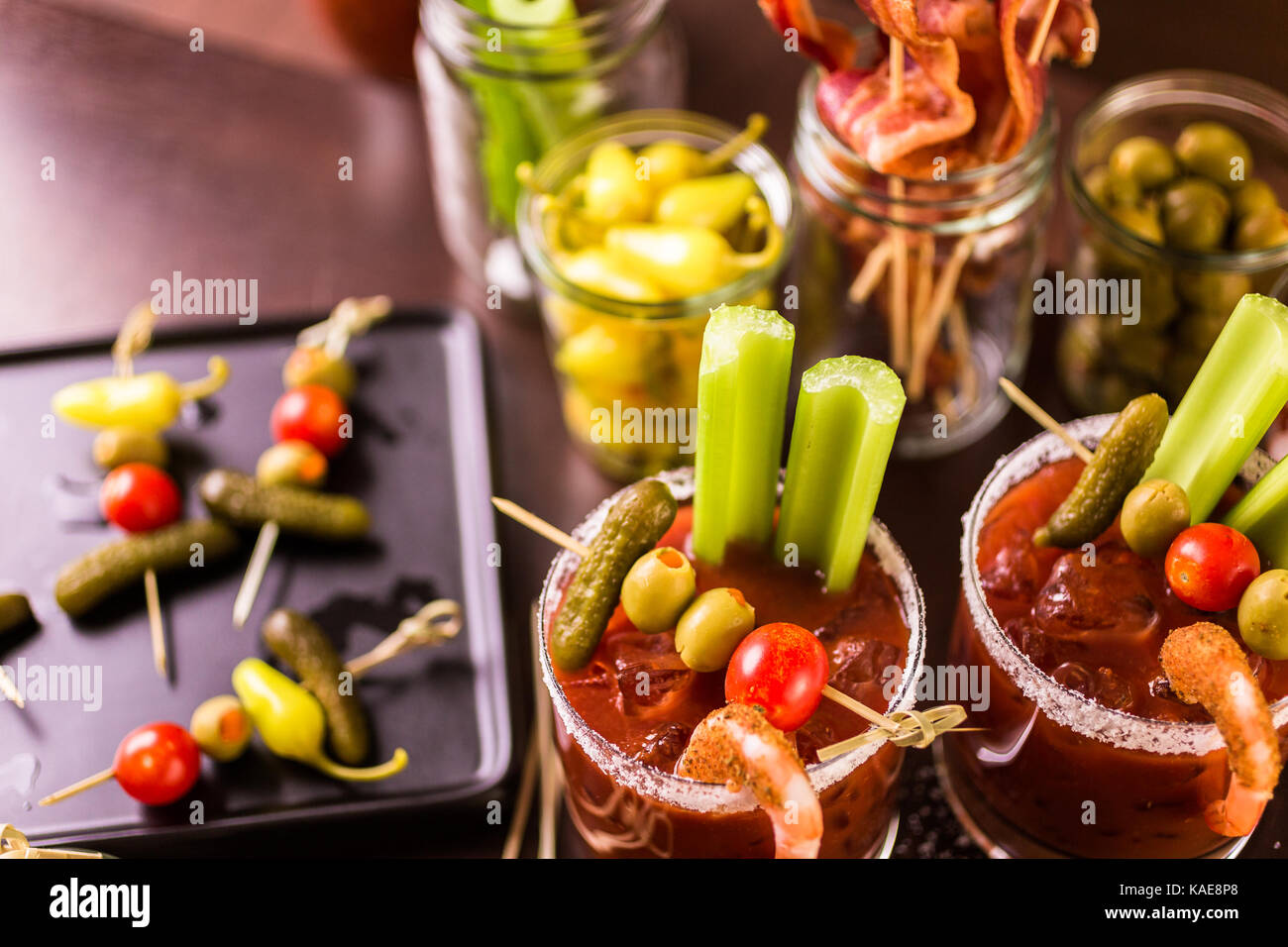 Bloody mary cocktail bar with variety of garnishes Stock Photo Alamy