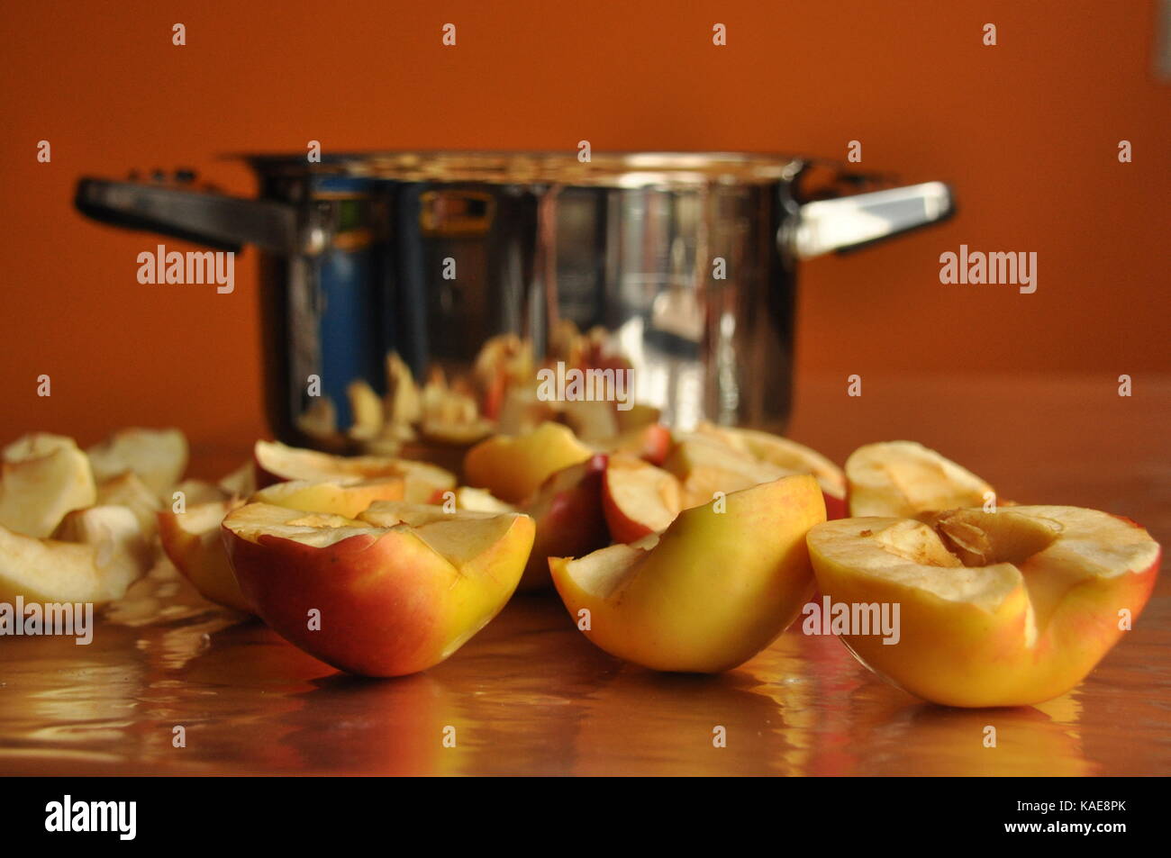 Sliced apples compote. Pot for preparing a beverage Stock Photo - Alamy