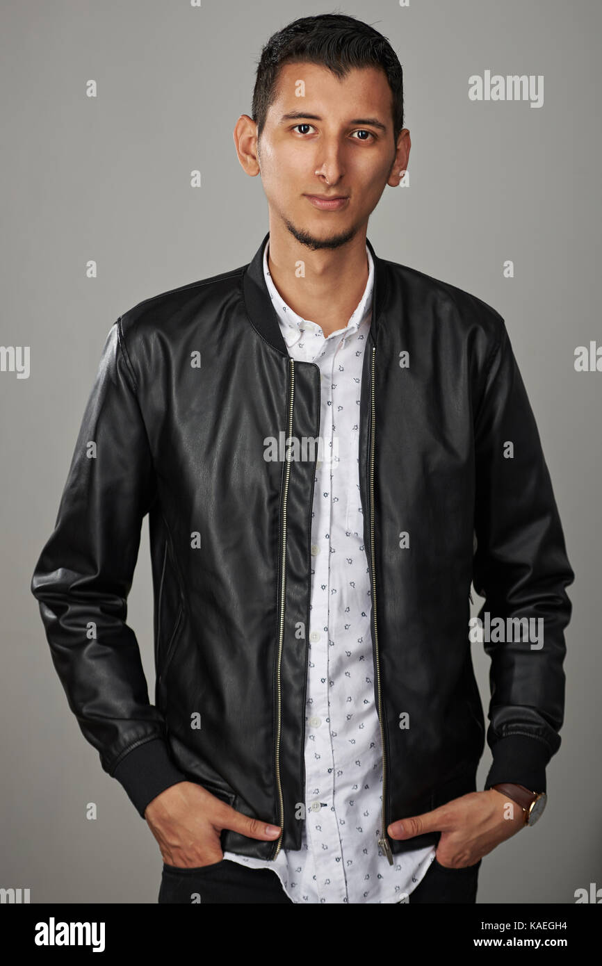 Positive young hispanic male hi-res stock photography and images - Alamy