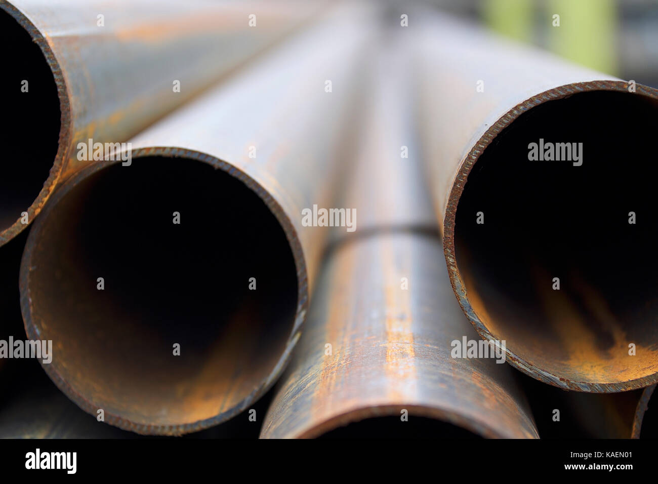 Metal profile pipe of round section in packs at the warehouse of metal ...
