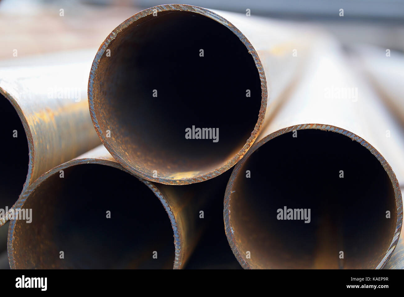 Metal profile pipe of round section in packs at the warehouse of metal ...