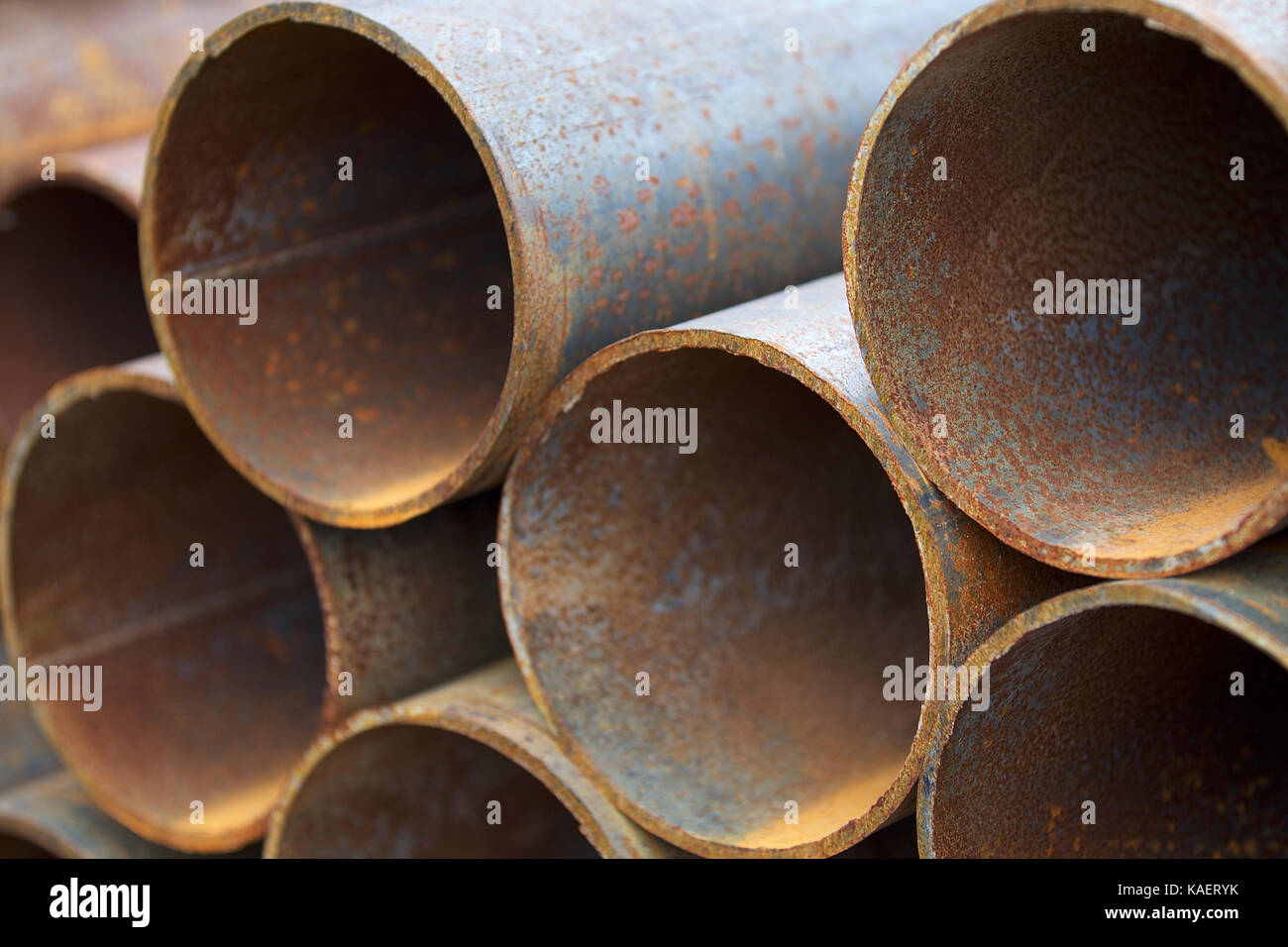 Metal profile pipe of round section in packs at the warehouse of metal ...