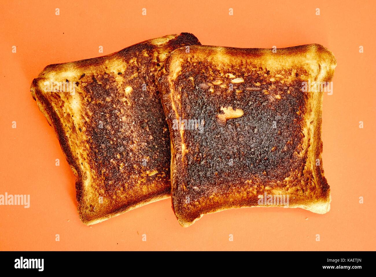 A studio photo of burnt toast Stock Photo Alamy