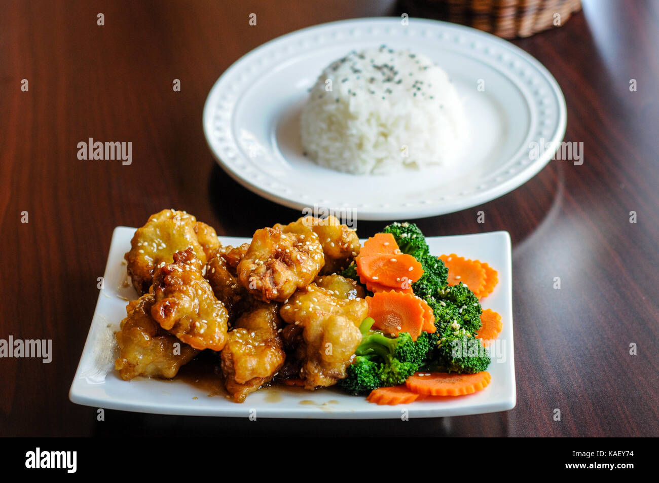 Sesame Chicken, Lightly breaded chicken with broccoli, carrots and