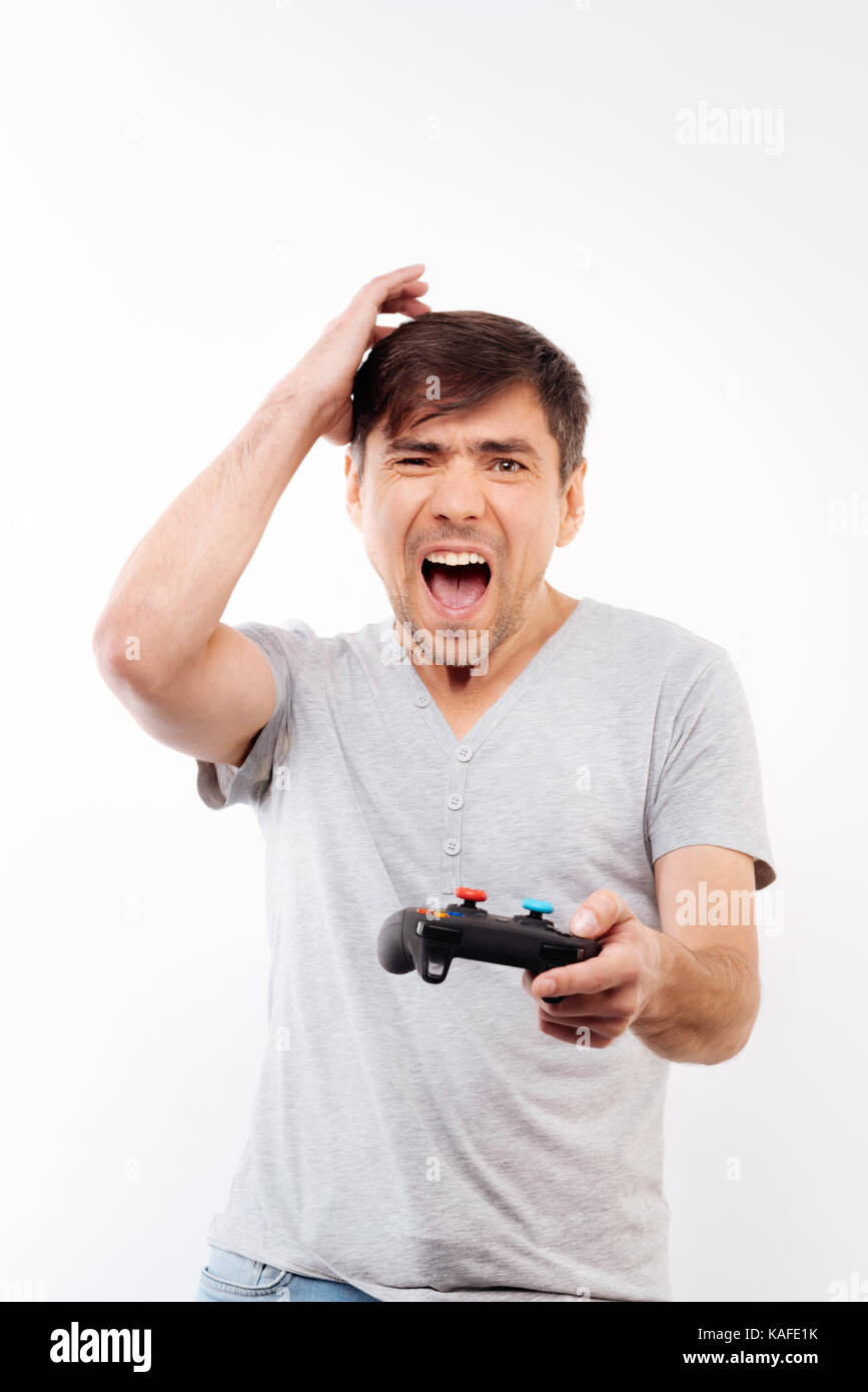Middle aged man technology frustrated hi-res stock photography and ...