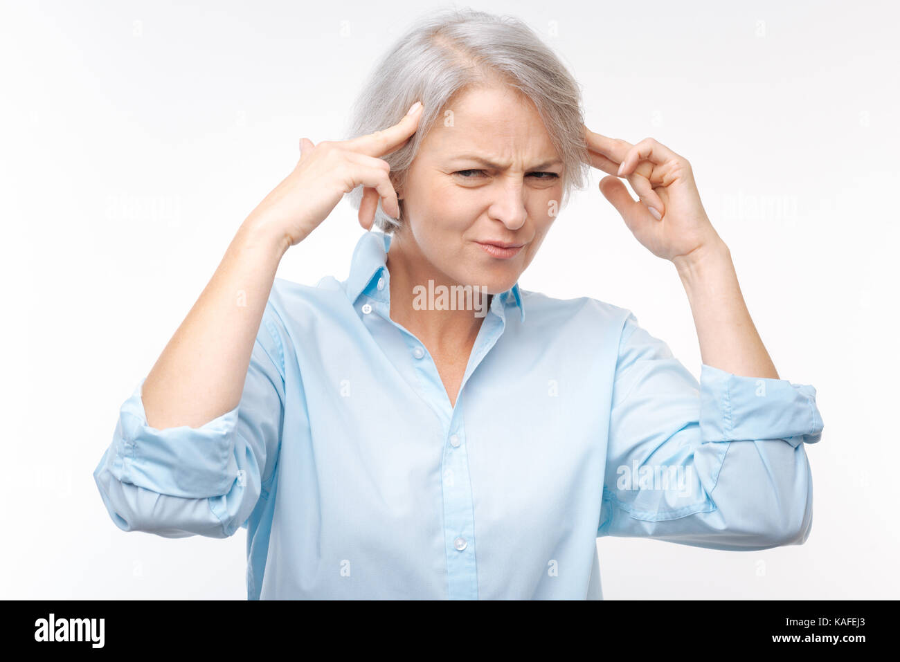 Fingers to temples hi-res stock photography and images - Alamy
