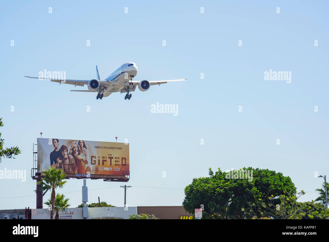 Los Angeles, SEP 24 Airplane flying down to the busy Los Angeles