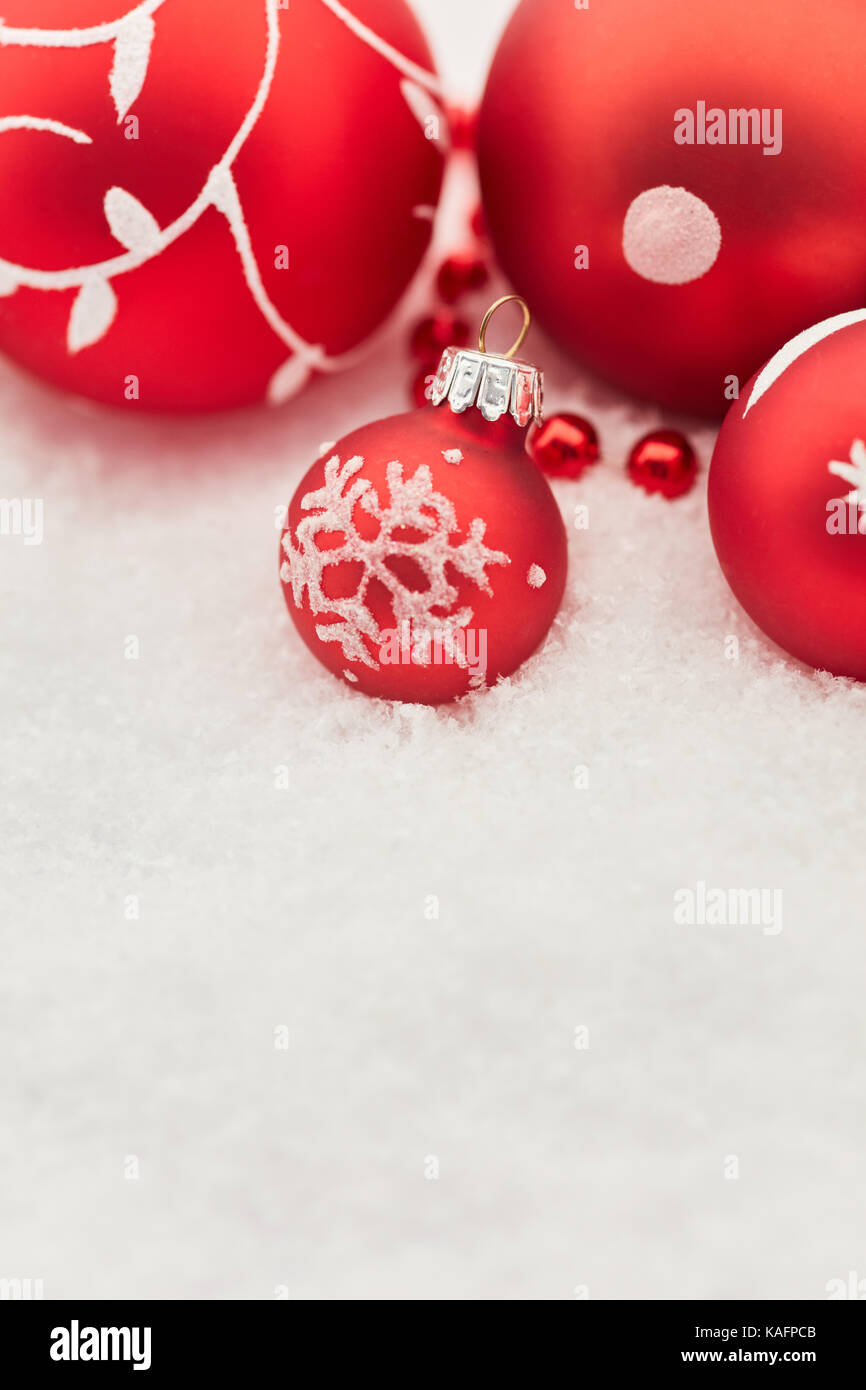 Red christmas ball in the snow hi-res stock photography and images - Alamy