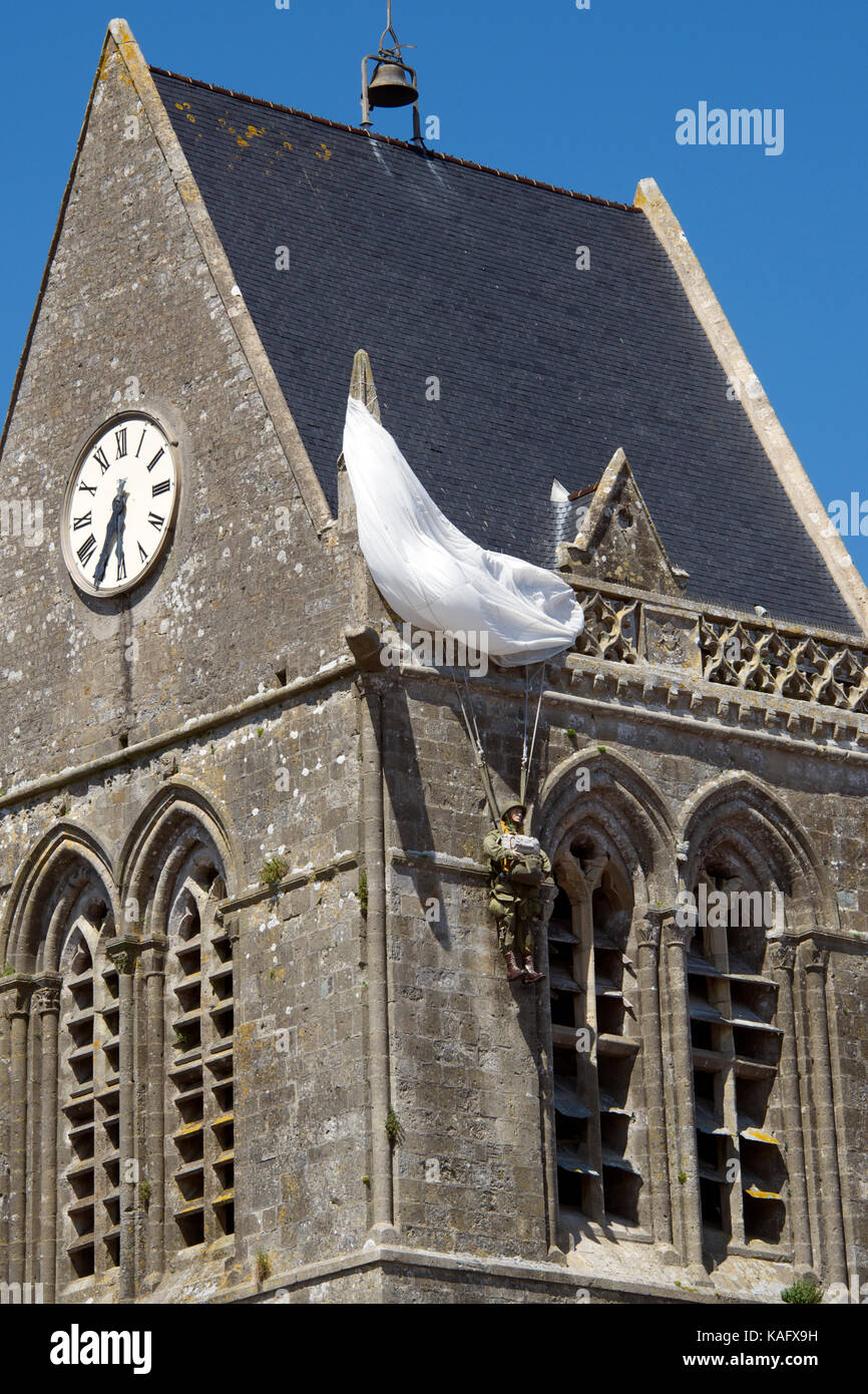 Memorial to American paratrooper John Steele church tower SainteMere