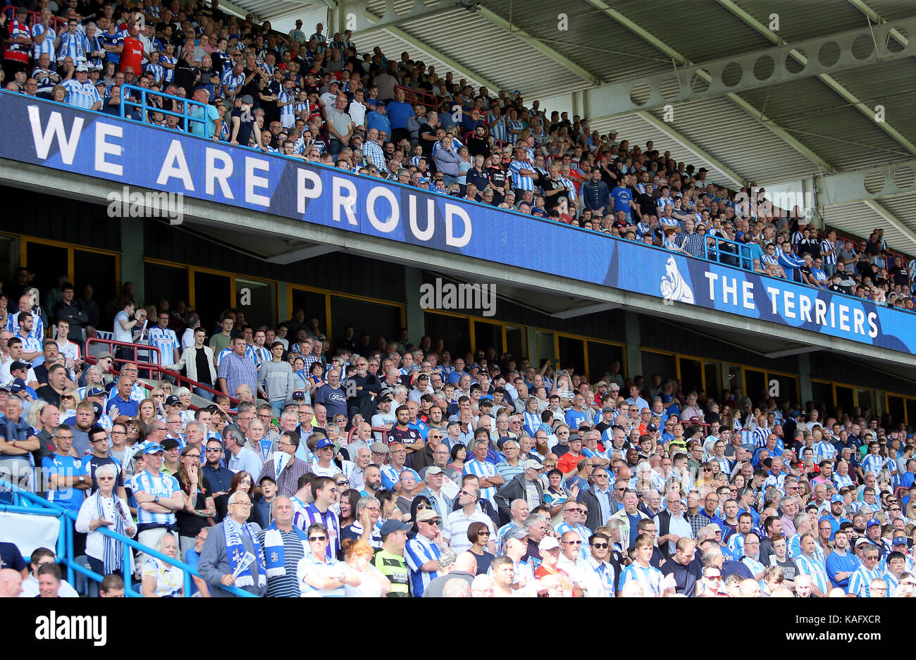 Huddersfield Town fans in the stands Stock Photo - Alamy