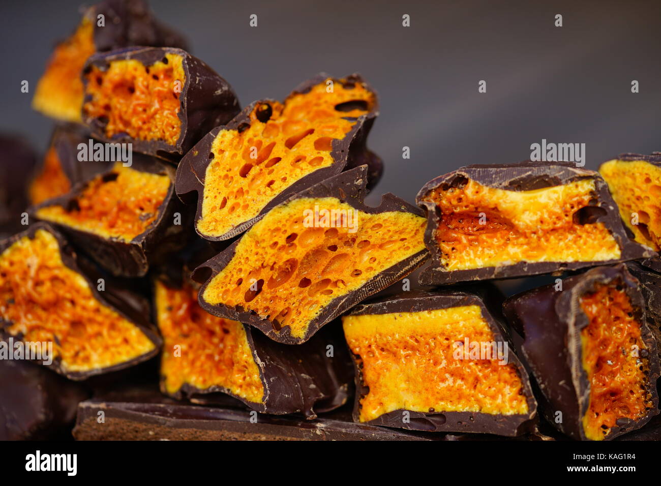 Crunchy chocolate covered candy Stock Photo Alamy