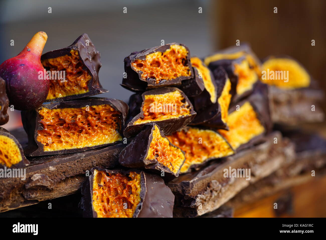 Crunchy chocolate covered candy Stock Photo Alamy