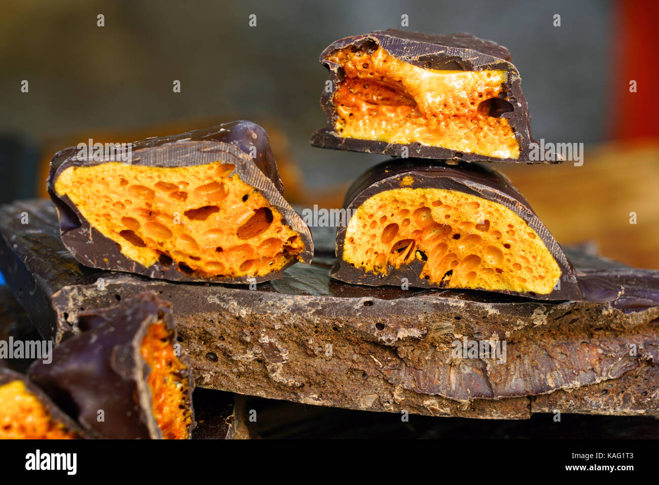 Crunchy chocolate covered candy Stock Photo Alamy