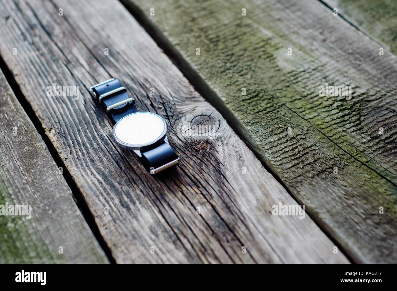 stylish watch on the vintage wooden floor Stock Photo