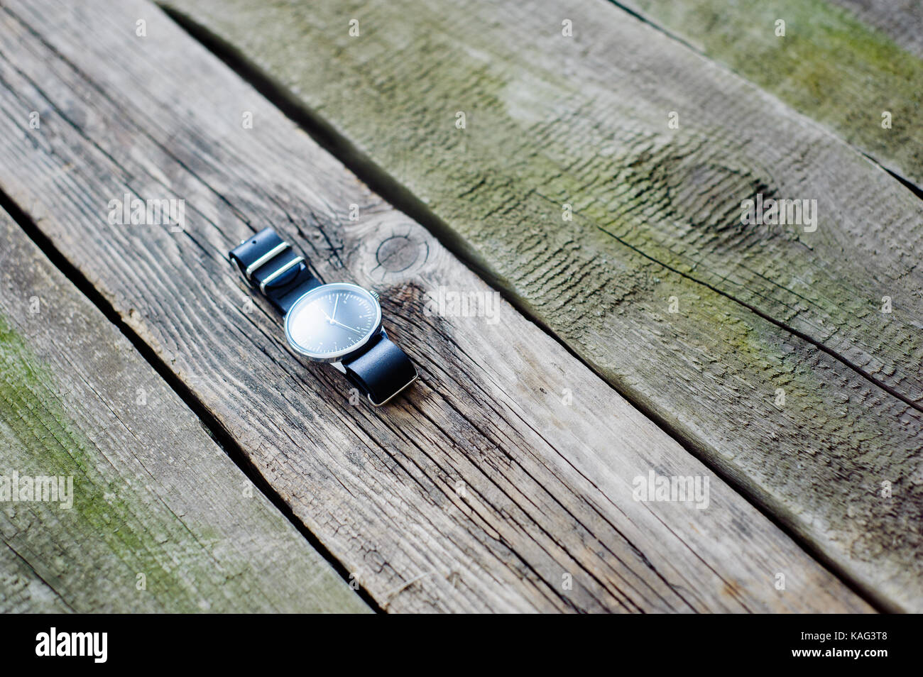 stylish watch on the vintage wooden floor Stock Photo