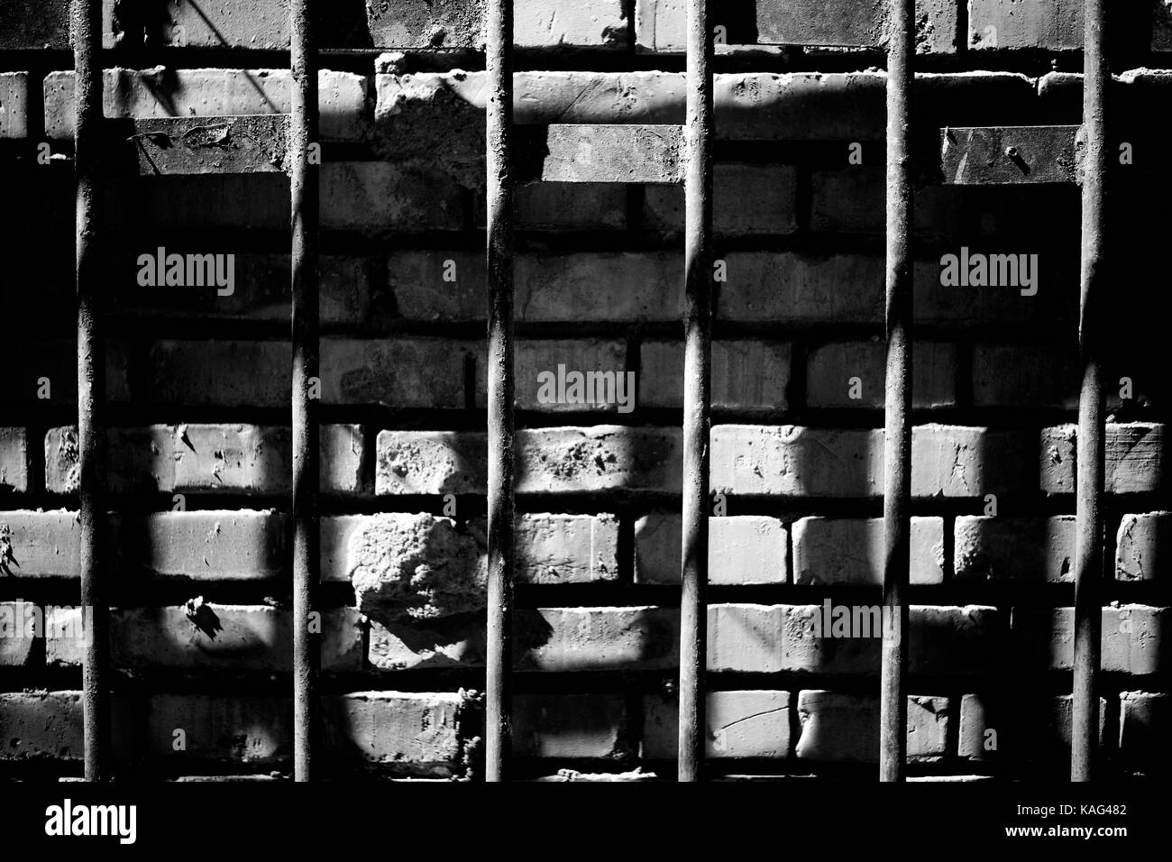 The bars on the brick wall Stock Photo Alamy