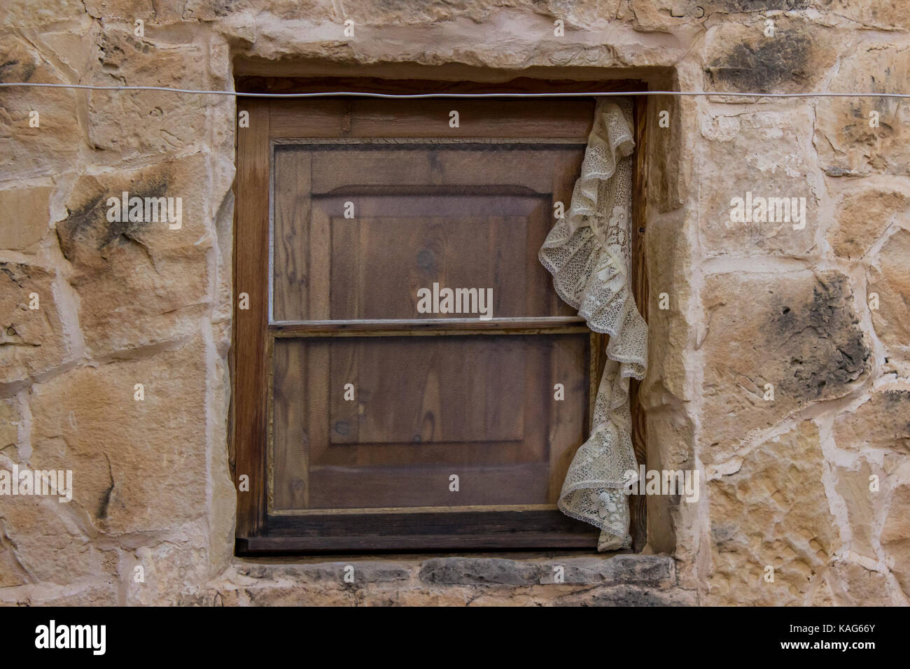 Old wooden window on stone house Stock Photo - Alamy