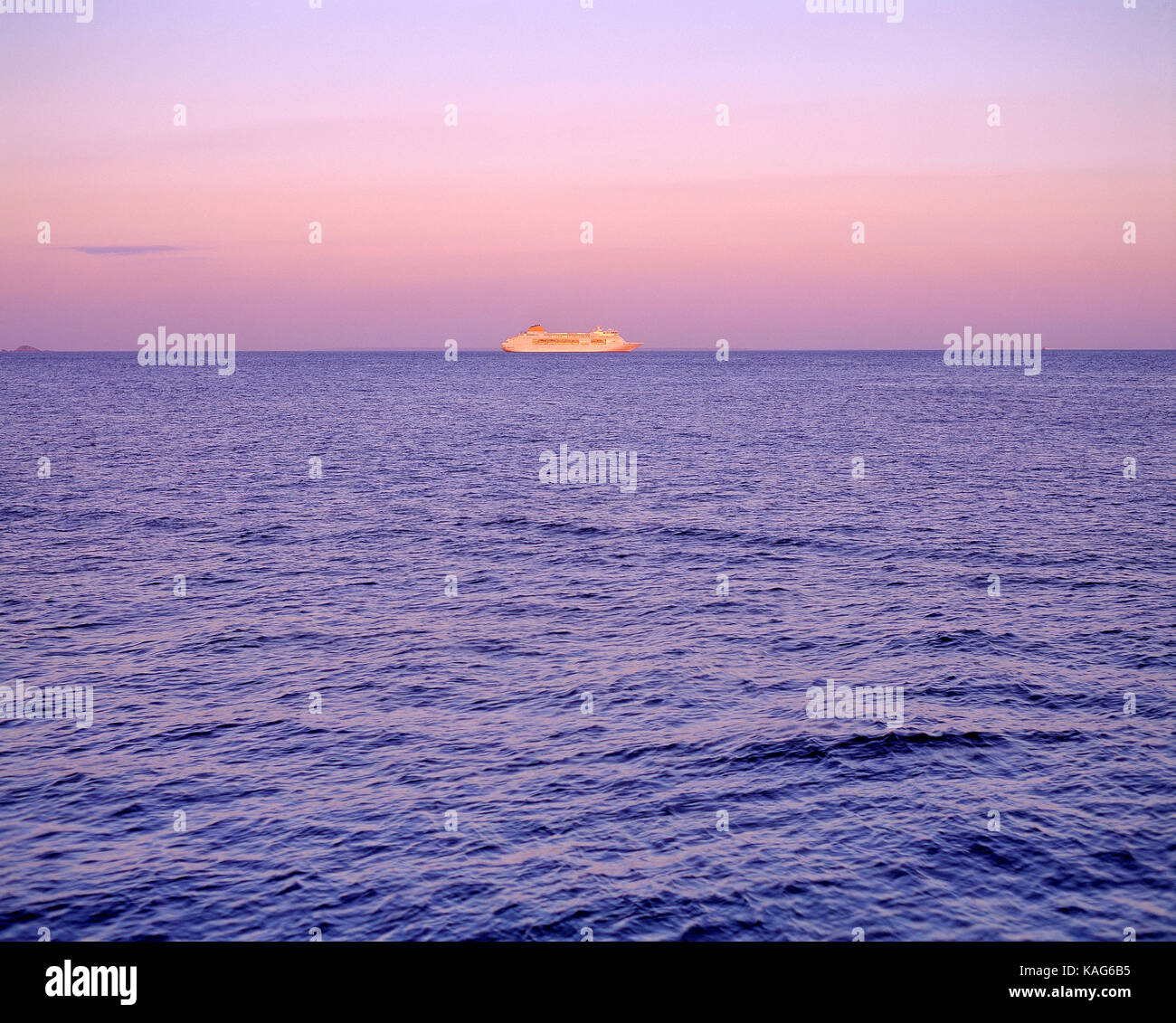 Cruise ship on horizon. Late evening in the English Channel. Stock Photo