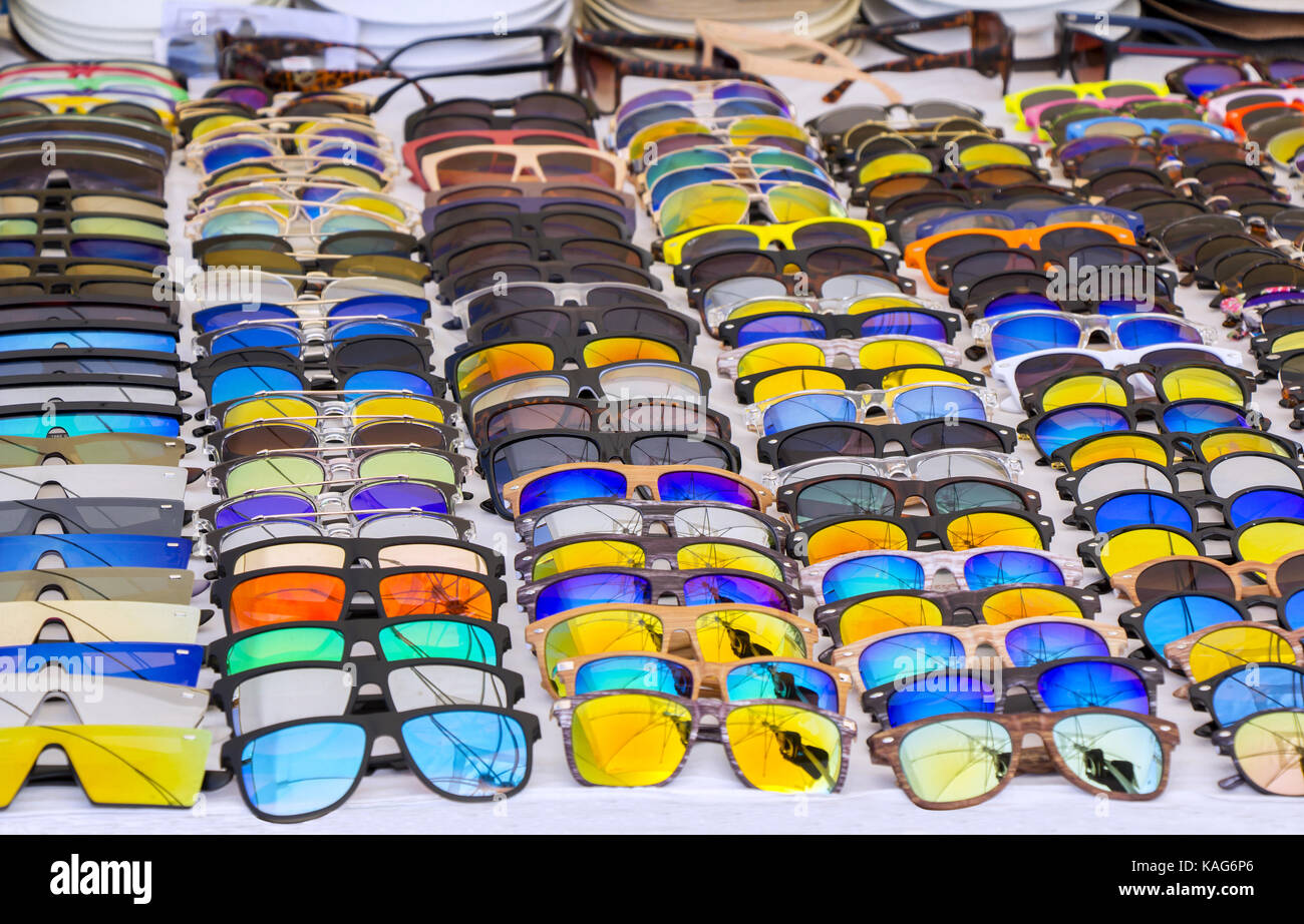 Colorful Sunglasses for sale at street market Stock Photo Alamy