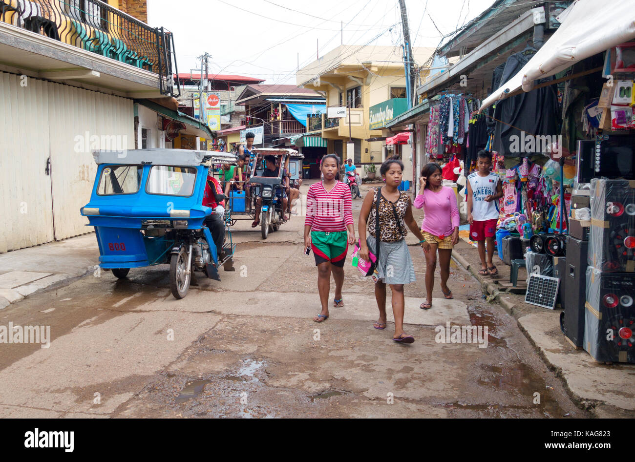 Coron; Philippines town on Busuanga island, Palawan- street scene - Filipinos shopping; Palawan, Philippines, Asia Stock Photo